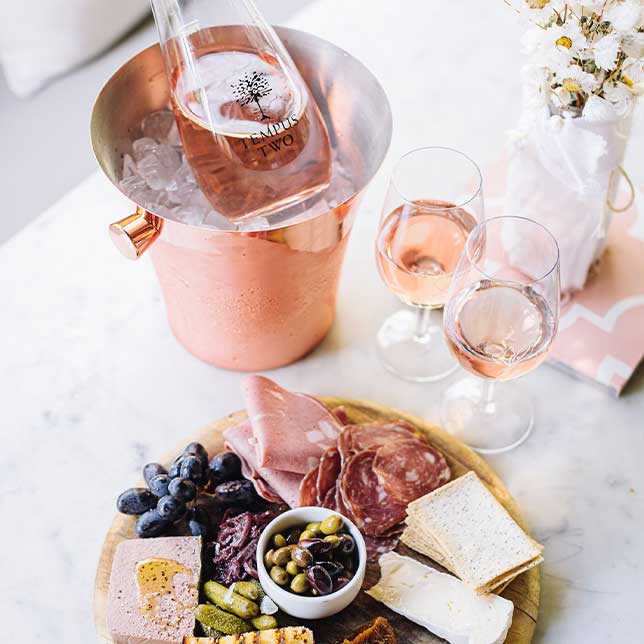 Rose wine glass with charcuterie board